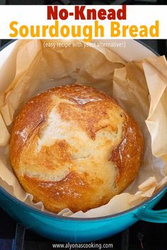 no knead sourdough bread in a blue dutch oven with text overlay