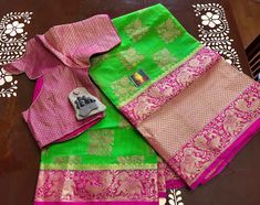 This is a beautiful Light weight warm silk saree with designer stitched blouse. This saree would be worn for almost any occasion such as birthday party to evening gatherings. Color of the saree is bright 🦚 green with border bright pink color with all over floral zari butta. Blouse is perfectly stitched and designed and can fit to size 36-46inches Chest. Ships immediately. Designer Wedding Saree For Navratri, Designer Saree For Wedding And Navratri, Designer Pre-draped Saree For Festivals, Designer Pre-draped Saree With Unstitched Blouse For Festivals, Designer Pre-draped Saree With Unstitched Blouse For Diwali, Designer Pre-draped Saree With Pallu, Designer Self-design Blouse Piece For Wedding, Designer Self Design Blouse Piece For Wedding, Designer Saree With Traditional Drape