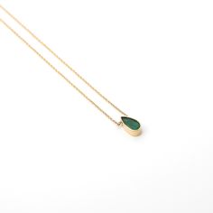 This necklace was the result of the "Emerald project", created between a group of friends with the need to share feelings, it represents that spark of light in your heart when you think about friendship. - Handmade necklace- Adjustable 14kt yellow gold chain measures 8 1/4” or 6 1/4” long (21cm or 16cm long)- Emerald is set in handcrafted, recycled 14k yellow gold- Recycled 14k yellow gold chain Teardrop Birthstone Necklace For Jewelry Making, Oval Pendant Crystal Necklace With Gemstone For Gift, Emerald Drop Gemstone Necklace, Crystal Necklace With Oval Gemstone Pendant For Gifts, Fine Jewelry Teardrop Birthstone Necklace, Emerald Teardrop Pendant Necklace For Anniversary, Gift Crystal Necklace With Oval Gemstone Pendant, Gift Oval Pendant Crystal Necklace With Gemstone, Minimalist Gemstone Necklaces For May Birthstone