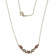 Elevate her style with our 18K Solid Yellow Gold Enamel Pink and White Mini Hearts Necklace, featuring five tridimensional enamel mini hearts. Designed for ages 12 and up, it comes with a 16-inch chain and an extra ring at 15 inches, all crafted from hypoallergenic 18k gold. Complete with an Amalia gift box and bag, providing an elegant presentation, and it pairs beautifully with the matching bracelet (SKU FAT2000HB), ensuring a coordinated and sophisticated look. Make a statement with this exqu Enamel Necklaces For Anniversary On Valentine's Day, Yellow Gold Enamel Heart Pendant Necklace, Elegant Enamel Necklace With Heart Charm, White Hallmarked Necklace For Valentine's Day, Elegant Heart Pendant Enamel Necklace, Elegant Enamel Heart Pendant Necklace, Elegant Enamel Necklace For Valentine's Day, Anniversary Yellow Gold Enamel Necklace, Gold Heart-shaped Enamel Necklace