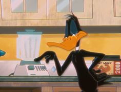 an animated image of a person sitting at a counter