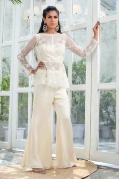 Shop for Kanj by Priyanka A Sakhuja Ivory Silk Satin Luca Peplum Top And Pant Set for Women Online at Aza Fashions Elegant Sequined Peplum Sharara, Fitted Embellished Peplum Palazzo Set, Embellished Fitted Peplum Palazzo Set, Elegant Peplum Sharara For Party, Elegant Organza Pant Set For Party, Elegant Organza Party Pant Set, Elegant Embellished Peplum Set, Elegant Fitted Floor-length Pant Set, Fitted Organza Pant Set For Wedding