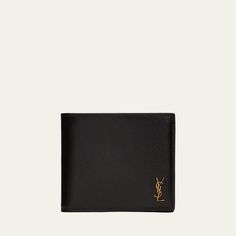 Saint Laurent wallet in smooth calf leather with metal YSL monogram in the corner. Interior: two bill compartments, eight card slots, two receipt pockets. Approx. 3.7"H x 4.3"W x 0.9"D. Made in Italy. Classic Tan Business Wallets, Classic Formal Wallet With Logo Plaque, Classic Formal Wallets With Logo Plaque, Designer Tan Wallets For Formal Occasions, Luxury Trifold Wallet With Smooth Grain, Luxury Trifold Wallet For Formal Occasion, Saint Laurent Wallet, East West, 7 H