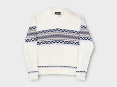 This JCPenney vintage men's sweater is the perfect addition to your winter wardrobe. With a fair isle knit pattern and cable-knit style, it's a classic piece that will never go out of style. The collared neckline adds a touch of sophistication, making it versatile for both casual and party/cocktail occasions. The long sleeve sweater is made of breathable acrylic material, which is machine washable for easy care. It comes in size medium and has a regular fit.  This sweater brings back memories of the 80s and 90s, and has a hipster, preppy vibe to it. Perfect for skiing and walking, it's a must-have for winter. The white color is complemented by a ski, holiday, and classic theme, making it a versatile piece for any winter occasion. This vintage sweater was made in Taiwan and is sure to keep Classic Winter Sweater With Fair Isle Pattern, Classic Fair Isle Sweater For Winter, Classic Fair Isle Winter Sweater, White Winter Polo Sweater With Ribbed Collar, Retro Winter Polo Sweater With Ribbed Collar, White Polo Sweater With Ribbed Collar For Winter, Retro Polo Sweater With Ribbed Collar For Winter, White Ribbed Collar Polo Sweater For Winter, White Wool Polo Sweater For Winter