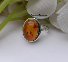 Natural Amber Ring, Amber Gemstone Ring, Beautiful Amber Ring, Amber Stone Jewelry, November Birthstone Ring, 925 Silver Ring, Stylish Ring Amber Stone Benefits Amber helps to balance the emotions, clear the mind and release negative energy. It aids manifestation, eases stress by clearing phobias and fears, and it's a lovely warm stone to wear Yellow amber has been used traditionally by natural healers to improve memory, increase mental flexibility and create balanced decision-making. Amber has Sterling Silver Amber Birthstone Rings, Classic Amber Jewelry For Anniversary, Amber Sterling Silver Jewelry For Anniversary, Amber Cabochon Ring For Anniversary, Amber Sterling Silver Rings For Anniversary, Amber Jewelry With Polished Finish For Anniversary, Amber Birthstone Rings For Anniversary, Amber Open Ring For Anniversary, Amber Rings For Anniversary In Fine Jewelry Style