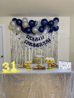 a birthday party with balloons and streamers