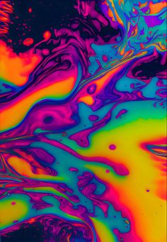 an abstract painting with multicolored paint on the surface and in the middle it appears to be fluid