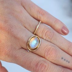 Moonstone cabochon 14k yellow gold 1.3mm band thickness Handmade by Halcyon Jewelry in Maine Timeless jewelry made by hand. Inspired by the ancients, imbued with magic, and made with love & sustainability in mind. Made with recycled metals and responsibly sourced stones. Moonstone Jewelry, Handmade Rings, Timeless Jewelry, Recycled Metal, Moonstone Ring, Made With Love, Handmade Ring, Moonstone, Diy Jewelry