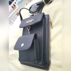 Xoxo Cellphone Crossbody Bag With Mini Coin Purse. Black Phone Bag With Cell Phone Pocket For Travel, Black Travel Phone Bag With Cell Phone Pocket, Black Phone Bag With Cell Phone Pocket, Black Phone Bag For On-the-go, Chic Black Phone Bag With Cell Phone Pocket, Black Phone Bag With Hidden Sleeve For Daily Use, Black Crossbody Phone Bag For On-the-go, Portable Black Phone Bag For On-the-go, Black Phone Bag With Cell Phone Pocket For On-the-go