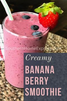 a banana berry smoothie in a glass with strawberries on the rim and text overlay