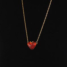 "Vintage Adorable Small Transparent Red Heart Pendant hard to find...from the 1960s. Check out all the multiple colors we have! We were soooo excited when we found these in our vintage vault. Price is for one heart pendant with 16\" vintage chain. This is a fabulous pendant to add to your vintage collection. Collect all colors while they last! This cute little heart measures 5/8\" in height and 7/8\" wide. Also available in red, orange, ivory and Blue. Please feel free to convo with any question Retro Heart-shaped Necklace Gift, Retro Heart-shaped Necklace For Gift, Retro Heart-shaped Jewelry Gift, Retro Heart-shaped Jewelry For Valentine's Day, Vintage Red Jewelry With Heart Charm, Vintage Red Necklace With Heart Charm, Vintage Heart Cut Necklace For Gift, Vintage Heart Pendant Necklace With Heart Beads, Vintage Red Heart-shaped Necklace