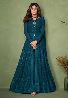 Buy Indian Party wedding wear salwar Shamita shetty teal georgette indo western lehenga choli 9144 online in USA, UK and Canada from KollyBollyEthnics.com Indo Western Lehenga, Western Lehenga, Long Choli Lehenga, Teal Suit, Indo Western Gown, Gown Suit, Indo Western Dress, Anarkali Gown, Anarkali Suit