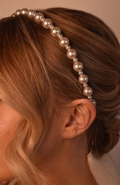 The L. Erickson Studded Pearl Headband is a chic and comfortable headband. Resembling a strand of pearls, this headband is a great choice for any occasion. Elegant and stylish, these pearls will add to your outfit.Product Features:- Imported by L. Erickson- Great for all hair types- Comfortable, easy styling solution- Made of Metal & Faux Pearl- Dimensions: 1/2" wide Elegant Hairstyles With Pearls, Pearl Hairband Hairstyle, Pearl Headband Hairstyles, Wedding Hair With Headband, Pearls In Hair, Pearl Hairband, Pearl Headbands, Pearl Hair Accessories, Pearl Headband Wedding