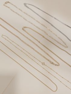 This statement Paperclip Chain is crafted from 14K yellow gold filled or sterling silver links, with an elongated cable design for an unparalleled shine. It includes a secure lobster clasp closure Now you can be sure to make a lasting impression, no matter the occasion. Everyday Rolo Chain Link Necklace, Everyday Silver 14k Gold Filled Chain Necklace, Dainty Gold Paperclip Bracelet With Cable Chain, Dainty Rolo Chain Link Necklace, Classic Gold Rolo Chain Necklace, Gold Paperclip Bracelet With Cable Chain, Classic Gold Paperclip Bracelet With Delicate Chain, Gold Paperclip Bracelet With Cable Chain For Everyday, Timeless Gold Paperclip Chain Bracelet