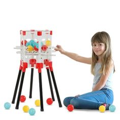 Inject excitement into your next game night with the Jumbo Tumbling Marble Stacking Game! This giant-sized take on a classic favorite brings giant-sized fun for the whole family. The game is easy to understand yet thrilling to play. Players take turns carefully removing rods from a towering structure that holds a collection of marbles. But be careful! A shaky hand or a misplaced rod can send the marbles tumbling down, ending your turn. The player with the fewest dropped marbles wins, making for Game For Party, Balance Game, Marble Games, Gift Giver, Family Game, Play Toys, Ways To Relax, Family Game Night, Classic Games