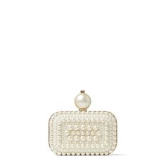 Our MICRO CLOUD handbag is crafted in Italy from white suede. The little sister to the CLOUD Clutch, our mighty mini is embellished with all-over pearls and topped with a statement-making pearl and crystal clasp. Keep yours close and cue compliments Jimmy Choo Clutch, Clutch Bag Wedding, Designer Clutch Bags, Jimmy Choo Bag, Suede Clutch, Bridal Bag, Wedding Clutch, Bridal Clutch, Designer Clutch