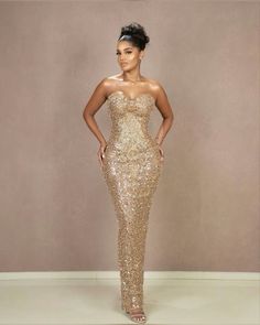 Black And Gold Graduation Outfit, Red Carpet Dresses Black Women, Black And Gold African Dress, Gold Glam Dress, Gold Strapless Prom Dress, Gold Prom Dresses 2024, Nude Prom Dresses Black Women, Prom Dresses 2024 Brown Skin, Formal Dress Poses Women