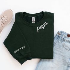 Custom Father Embroidery Sweatshirt, Personalized Papa Hoodie, Papa T-shirt, Gift for Father, Custom Dad Sweatshirt, Papa T-shirt, Gift Dad ⭐⭐ Atlascustomtees ⭐⭐ ⭐     Sweatshirts and Hoodies: 8-ounce, 50/50 cotton/poly.              T-Shirts:  6-ounce, 100% combed ring spun cotton, which is a ticker garment that would hold the stitches.              Polo T-Shirts: 6 oz./yd²- 6.5 oz./yd² ring-spun US cotton ⭐   Shipping: Ground Advantage shipping 2-5 business day. For express shipping you should Green Long Sleeve Top With Embroidered Logo, Fan Apparel T-shirt With Embroidered Graphics And Crew Neck, Fan Apparel Crew Neck Tops With Embroidered Graphics, Fan Apparel T-shirt With Embroidered Graphics, Fan Apparel Top With Embroidered Graphics, Casual Green Sweater With Embroidered Graphics, Green Letter Embroidery Sweatshirt For Streetwear, Green Sweatshirt With Letter Embroidery For Streetwear, Green Long Sleeve T-shirt With Embroidered Logo