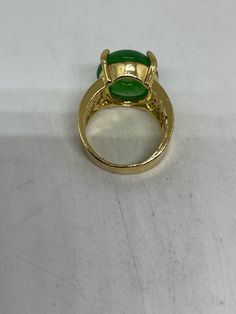 Vintage Lucky Green Nephrite Jade ring Large green nephrite jade Ornate gold finished White bronze Vintage ring, does not tarnish, NOT sterling Size 6.5, 7, 7.5, or 8 ONLY My jeweler can custom re size for a $10-$20 fee All rings are shipped free in the US in a nice gift box. Check out our over a THOUSAND great reviews Engraving is $4 per letter and is not always perfect depending on the piece. It can take a few days if the jeweler is busy. This is payable to Paypal Judithsltd@gmail.com Formal Green Enamel Ring With Polished Finish, Green Oval Enamel Ring For Formal Occasions, Green Oval Enamel Ring For Anniversary, Green Oval Enamel Anniversary Ring, Oval Green Enamel Anniversary Ring, Formal Green Oval Enamel Ring, Formal Oval Green Enamel Ring, Gold Jade Ring With Polished Finish, Green Open Ring For Formal Events