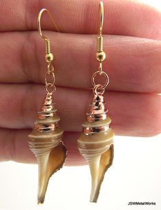 Gold Turrid Shell Earrings Beach Jewelry Gold by JSWMetalWorks Gold Drop Earrings For Vacation, Gold Shell Dangle Earrings, Gold Dangle Earrings For Beach, Gold Earrings For Beach Season, Beachy Gold Shell-shaped Jewelry, Beachy Gold Dangle Earrings, Shell-shaped Gold Shell Earrings, Gold Shell-shaped Shell Earrings, Gold Dangle Shell Earrings For Beach