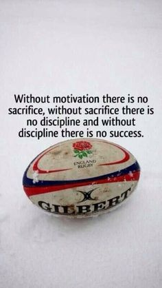 a rugby ball sitting in the snow with a quote on it that says, without motivation there is no sacri