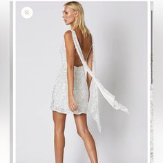 Step Into Cocktail Party Heaven With This Dazzling White Mini Sequin Dress. Perfect For Your Next Birthday, Engagement, Or Any Special Event! New With Tags - **Features:** - Deep V Front - Open Low Back - Adjustable Straps With Draped Sash Detailing - Relaxed Hem This Dream Cocktail Dress Combines Elegance And Allure, Ensuring You Stand Out At Any Gathering. **Questions?** Leave A Comment Below! White Fitted Sequin Dress For Gala, White Sleeveless Backless Cocktail Dress, Sequin Mini Dress For Wedding, Sleeveless White Sequin Dress For Gala, Sleeveless White Sequin Wedding Dress, White Sleeveless Sequin Dress For Wedding, White Sleeveless Sequin Wedding Dress, White Cocktail Dress For Party Season, White Sequin Wedding Dress For Spring