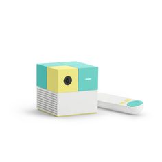 an object that looks like a box with a remote on it's side, sitting in front of a white background