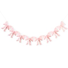 a string of pink bows on a white background