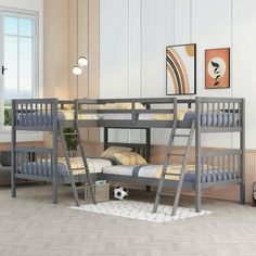 there is a bunk bed with two sets of ladders on the top and bottom