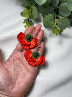 These handmade Poppy Dangle Earrings bring a touch of nature-inspired elegance to your wardrobe. Crafted from high-quality polymer clay, these lightweight, hypoallergenic earrings feature a vibrant red floral design, perfect for those who love unique botanical jewelry. The intricate poppy petals evoke a sense of botanical beauty, making these earrings an ideal gift for flower lovers, nature enthusiasts, or anyone who appreciates handcrafted, artistic jewelry. Perfect for casual or dressy occasio Poppy Petals, Polymer Clay Flower Jewelry, Art Deco Floral, Floral Trends, Flower Handmade, Earrings Art, Floral Jewelry, Botanical Jewelry, Botanical Beauty