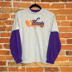 Vintage Early 2000's Phoenix Suns long sleeve t-shirt Brand: Reebok Size: Youth Large (14-16) Throwback Long Sleeve T-shirt For College, Throwback Long Sleeve Letter Print T-shirt, 90s Long Sleeve T-shirt For Spring, 90s Style Long Sleeve T-shirt For Spring, Fall Sports Long Sleeve T-shirt, Throwback Long Sleeve Top With Graphic Print, Throwback Long Sleeve Tops With Letter Print, Throwback Long Sleeve Streetwear Top, Throwback Long Sleeve T-shirt For Streetwear