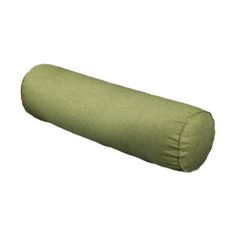 an image of a green pillow that is on the floor and in front of a white background