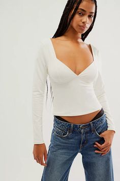 The Free People Duo Corset Long-Sleeve Cami in Ivory is a unique blend of romantic and edgy, making it a standout piece in your wardrobe. This isn't your average cami; it features a built-in corset-style bodice that cinches your waist for a flattering... Free People Duo Corset, Bohemian Inspiration, Triangle Top, Corset Style, White Summer, Bodice, Built In, Free People, Boutique