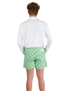 Navigate Style & Adventure with the Rhett Short Forget flimsy boardshorts and embrace versatile sophistication with the Rhett swim shorts. Designed for the man who seamlessly transitions from beachside lounging to boat deck chilling, these shorts offer superior style and functionality wherever your summer takes you. Land & Sea Ready: Quick-drying fabric: Dive into the ocean, then hit the town without a worry. The shorts dry rapidly, keeping you cool and comfortable all day long. Built-in liner: Green Swim Trunks With Built-in Shorts For Surfing, Fitted Surfing Shorts For Summer, Fitted Shorts For Surfing In Summer, Stretch Shorts For Beach Party, Fitted Swim Trunks For Surfing In Summer, Bottoms With Built-in Shorts For Surfing Vacation, Green Swim Trunks For Summer Beach Party, Green Swimming Shorts For Vacation, Green Swim Trunks For Poolside Vacation