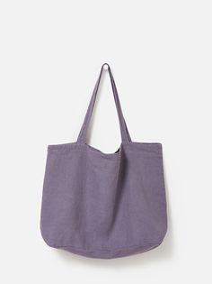 a purple bag hanging on the wall