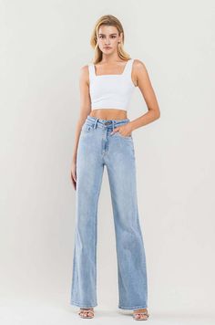 90's Stretch Vintage Flare Jeans Retro High Rise Flare Jeans For Spring, 90s Style Wide Leg Medium Wash Jeans, Casual Mid-rise Flare Jeans With Belt Loops, 90s Style Medium Wash Wide Leg Flare Jeans, 90s Inspired Wide Leg Denim Bottoms, 90s Inspired Medium Wash Mid-rise Bottoms, 90s Inspired Straight Leg Spring Bottoms, High Rise Flare Jeans With Belt Loops For Spring, Retro Straight Leg Bottoms With Frayed Hem