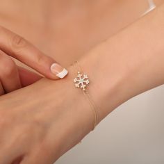 💍MATERIAL: This gold snowflake bracelet is crafted from 14k solid gold. This bracelet are in 2.4 grams of gold for 7.87 inches. Pave bracelet stones are made of zirconia material. It does not contain chemicals that may affect human health. 📏SIZE: This dainty bracelets length 6.7+1.18 inches. It is 1.18 inch extension. So you can adjust the length that best suits you. ⭐COLOR: You can choose the color that suits you best thanks to this unique 14k solid gold bracelet with three different options. These three different colors are Gold, Rose Gold and White Gold options. 🎁 A SPECIAL GIFT: This gold bracelet with zirconia will become the most favorite product of women with its unique and stylish design. You can get this pave gold bracelet to decorate your romantic moments. You can gift it to y Elegant Gold Holiday Jewelry, Gold Bracelet Jewelry For Holidays, Gift White Gold Bracelet With Cubic Zirconia, Fine Jewelry Snowflake Gift, White Gold Cubic Zirconia Bracelet Gift, Gold Holiday Bracelet, Elegant Christmas Bracelet Jewelry, Elegant Gold Jewelry For Holidays, Elegant Gold Jewelry For Holiday