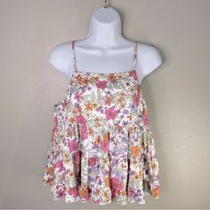 (Nwt!) Peach Love California “The Lucy” Floral Tiered Tank. Size Medium. Sleeveless. Tiered. White/Orange/Purple/Green Floral Print. Keyhole With Button Closure In Back. Excellent Condition-New With Tags. See Pictures. Pink Summer Tank Top For Vacation, Pink Summer Tank Top For Brunch, Pink Tank Top For Summer Brunch, Pink Tank Top For Brunch, Spring Vacation Pink Tank Top, Pink Tank Top For Spring Vacation, Peach Cami Top For Summer, Pink Tank Top For Beach In Spring, Pink Tank Top For Spring Beach Days