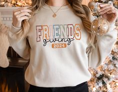 Friendsgiving Sweatshirt, Thanksgiving Friends Sweatshirt, Friends Sweatshirt, Thanksgiving Sweatshirt, The One With The Besties, Gift her Heather sport colors: 60/40 polyester/cotton 2-end mid weight fleece fabric Classic fit Air jet yarn for a softer feel and reduced pilling Double-needle stitching at shoulders, armholes, neck, waistband, and cuffs 1x1 rib with spandex for enhanced stretch and recovery Tear away label Thanksgiving Friends, Friends Giving, Thankful Sweatshirt, Friends Thanksgiving, Thanksgiving Sweatshirt, Friends Sweatshirt, Thanksgiving Gift, Fall Sweatshirt, Thanksgiving Gifts