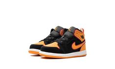 The Air Jordan 1 Mid TD "Vivid Orange" is the toddler sizing of the colorway of the casual shoe with orange accents.  The head-turning “Vivid Orange” Jordan 1 Mid features a black synthetic nubuck base with tonal overlays on the toe, forefoot, and eyelets.  Vivid Orange accenting is seen on the perforated leather toe, collar, heel, and Swoosh.  The blazing shade of orange can also be found on the Jumpman logo on the tongue.  A white rubber midsole and orange outsole complete the look.  Release d Orange Jordan, Jumpman Logo, Orange Shoes, Orange Accents, Stadium Goods, Casual Shoe, Kids Jordans, Air Jordan 1 Mid, Perforated Leather