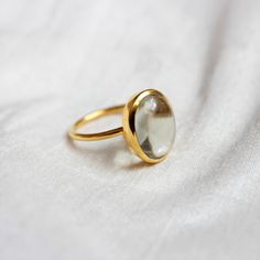 D E T A I L S - Material: 92.5 sterling silver Stone: Crystal The fit: true to US ring size Finish: smooth and Gold Plated to a high shine S H I P P I N G & P R O D U C T I O N - My current production time is 2-6 business days, which means after those days are up, your order ships! I make everything custom to order, by hand, but I promise you it's worth the wait! R U S H - M Y - O R D E R - If you're in a rush to get your pretty new pieces, please send me a message and I'll let you know just Silver Timeless Birthstone Ring Gift, Timeless Open Crystal Ring For Gift, Timeless Open Crystal Ring As Gift, Classic Oval Rings With Si Clarity, Gemstone Rings Suitable For Gift, Clear Gemstone Ring As Gift, Clear Gemstone Rings For Gift, Clear Si Clarity Rings As A Gift, Round Crystal Ring With Si Clarity For Anniversary