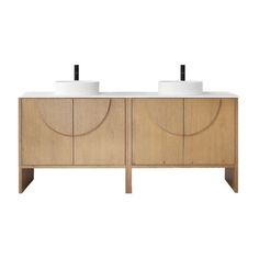 two white sinks sitting on top of a wooden cabinet