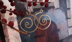 Hammered celtic brass handmade earrings Spirals. There's a reason the spiral is featured heavily in many cultures. It is an icon for expansive, cosmic wisdom, which our ancestors were highly connected to. Get a more intimate experience with this concept by incorporating the spiral in various ways. The earrings width 3 cm, hang 5 cm from the top of the ear wire. MY DEAR CUSTOMERS, PLEASE NOTE, THAT THE TIME OF DELIVERY FROM LATVIA (EUROPE) TO US CAN TAKE FROM 5 TO 30 DAYS. That is why I make your Spiral Brass Wrap Earrings As Gift, Bohemian Gold Spiral Wrap Earrings, Handmade Bohemian Swirl Earrings, Unique Hand Forged Spiral Earrings, Hand Forged Spiral Metal Earrings, Bohemian Gold Swirl Jewelry, Brass Spiral Earrings With Ear Wire, Gold Spiral Earrings Made Of Copper, Bohemian Spiral Copper Earrings