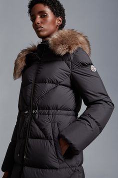 Designed for sophisticated women with a timeless style, the Busard down coat is easily layered over workwear and weekend leisure looks. The puffer coat is refreshed with graphic quilting. The long down jacket is finished with a luxurious, long hair shearling trim along the hood. Long Down Jacket, Sophisticated Women, Vests For Women, Down Jackets, Down Coat, Puffer Coat, Jacket Style, Outerwear Jackets, Down Jacket