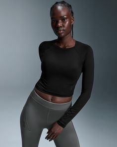 This cropped top is moisture-wicking and buttery soft, designed to fit so perfectly that you’ll forget you’re wearing it. Made from breathable, quick-drying and ultra-comfortable fabric. Cool to the touch and super soft, with a slightly stretchy feel for a luxurious finish. Perfect for low-intensity workouts like barre, Pilates and yoga. The Movement Long-T Crop is constructed with sleek simplicity. Modern. Minimalist. Designed to blend seamlessly with your own style identity, from the studio to Womens Movement, Barre Pilates, Low Intensity Workout, Running Accessories, Travel Shoes, Long T, Tennis Clothes, Lifestyle Clothing, Running Clothes