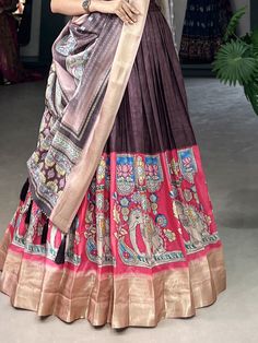 Introducing our "amazing burgundy kalamkari printed dola silk traditional lehenga choli", a stunning ensemble that combines traditional charm with modern elegance. This burgundy color lehenga features intricate kalamkari print and weaving border work, making it a unique and eye-catching choice for any festive occasion.
The set includes a dola silk choli in a similar color with printed work and weaving border details, as well as a matching dupatta with kalamkari print work and weaving border, com Semi-stitched Sharara With Kalamkari Print Traditional Drape, Multicolor Floor-length Lehenga With Kalamkari Print, Red Anarkali Sharara With Kalamkari Print, Traditional Sharara With Kalamkari Print For Navratri, Floor-length Kalamkari Print Dupatta, Unstitched Lehenga With Kalamkari Print, Semi-stitched Kalamkari Print Traditional Sharara, Traditional Semi-stitched Kalamkari Print Sharara, Traditional Sharara With Kalamkari Print For Festive Occasions