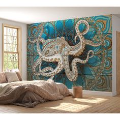 an octopus mural on the wall in a bedroom