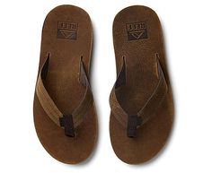 Reef Mens Voyage Le Flip Flop Sandal - Dark Brown Embrace the spirit of the beach with these leather Sandal s. Crafted from premium ISA lite full grain leather, these Sandalsare both stylish and functional. The non-abrasive strap, water-friendly design, and Swellular Technology make them perfect for any adventure, from the beach to the city. Reef swellular signature technology No break in period Sustainably sourced ISA lite waterproof full grain leather EVA footbed for Leather Open Toe Flip Flops For Surfing, Brown Summer Surfing Flip Flops, Brown Flip Flops With Leather Footbed For The Beach, Brown Leather Footbed Flip Flops For Beach, Brown Sandals For Surfing In Summer, Brown Summer Surfing Sandals, Brown Summer Sandals For Surfing, Rack Room, Room Shoes