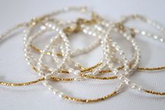 Pearl and gold Bracelet  Wedding Jewelry  Bridal Bracelet White Pearl Bracelet With Tiny Beads For Wedding, Delicate Gold Bracelets For Wedding, Adjustable Delicate Chain Bracelet For Wedding, White Pearl Wedding Bracelet With Tiny Beads, Delicate Gold Beaded Bracelets For Party, Dainty Beaded Bracelets For Wedding, Elegant White Pearl Bracelet With Tiny Beads, Minimalist Tiny Beads Wedding Bracelet, Minimalist Gold Beaded Bracelets For Wedding