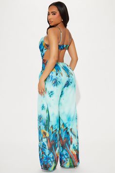 Available In Blue/combo. Jumpsuit Adjustable Spaghetti Straps Cowl Neck Back Cut Out Wide Leg Non Stretch Inseam= 33" Self: 100% Polyester Lining: 100% Polyester Imported | Best Of Days Jumpsuit in Blue size Medium by Fashion Nova Blue Spaghetti Straps Jumpsuits And Rompers, Light Blue Sleeveless Romper For Vacation, Blue Casual One-piece Jumpsuits And Rompers, Light Blue Summer Jumpsuits And Rompers, Blue Printed Bottoms For Summer, Blue Floral Print Sleeveless Jumpsuits And Rompers, Spring Blue Tropical Print Jumpsuits And Rompers, Blue Floral Print Bottoms For Beach Party, Light Blue Summer Jumpsuits And Rompers For Beach